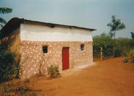 Father builds nice houses for the families in the village of Musha